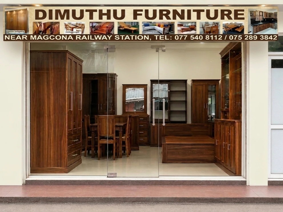 The elegant glass storefront and interior display of Dimuthu Furniture showroom